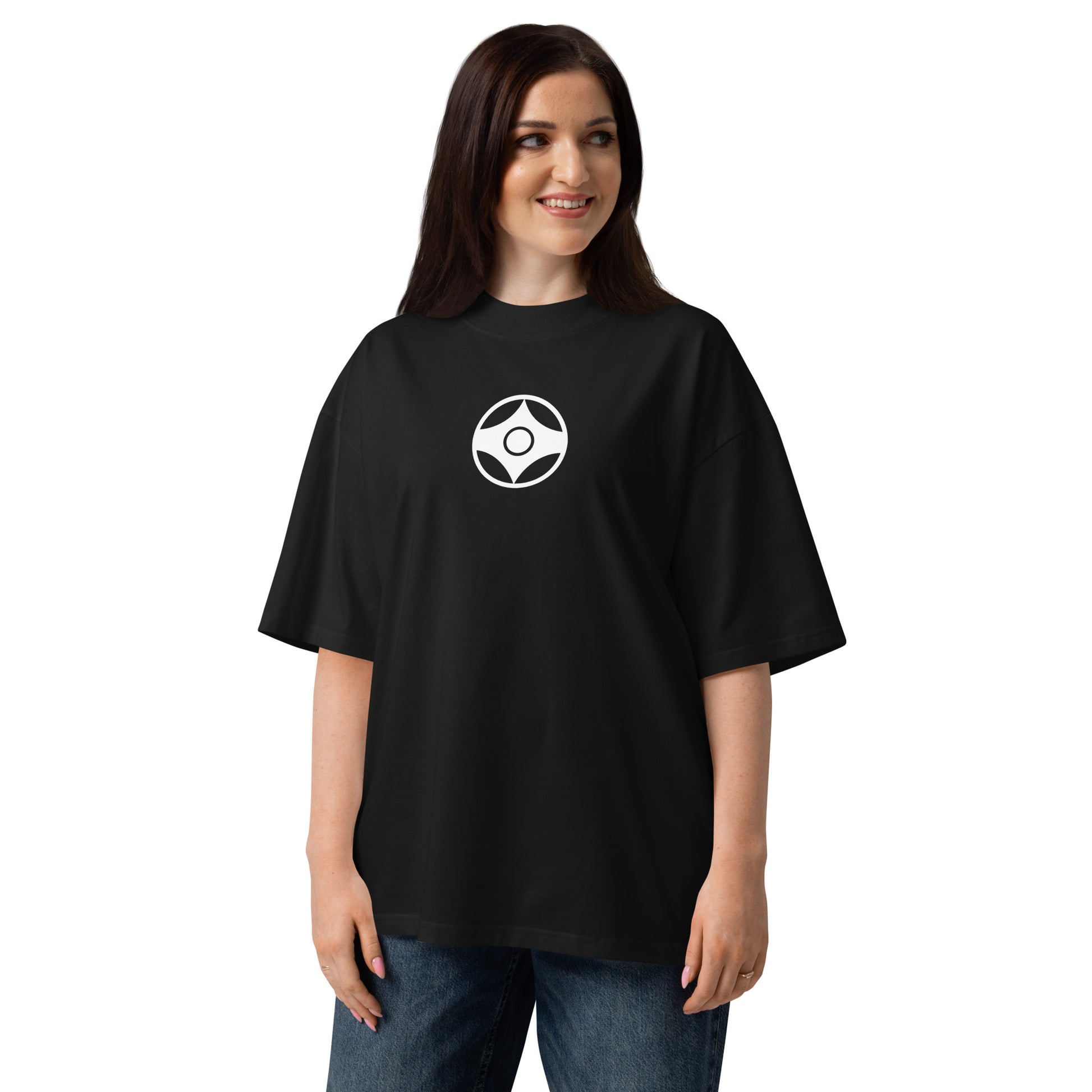 Woman wearing a black t-shirt with a logo on a white background