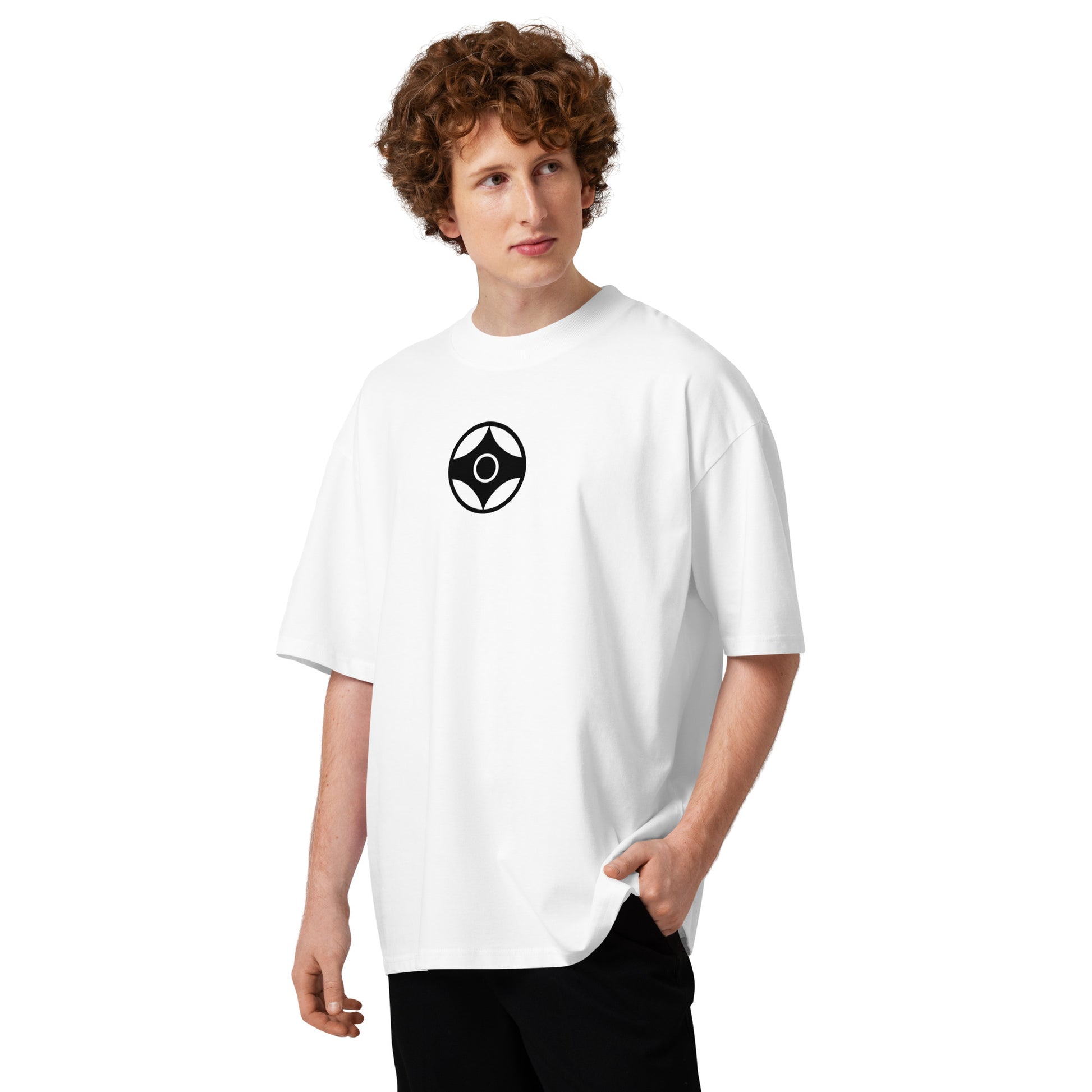 Person wearing a white t-shirt with a colorful heart design on a white background