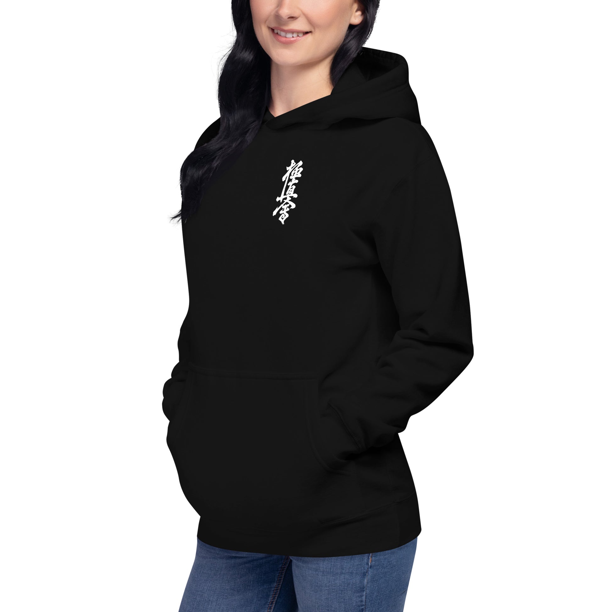 Person wearing a black hoodie with a logo on the chest against a white background