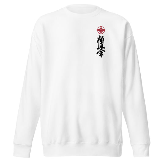 A white crewneck sweatshirt with a small red kanku logo and black kyokushin calligraphy printed vertically on the left chest, shown against a plain white background.